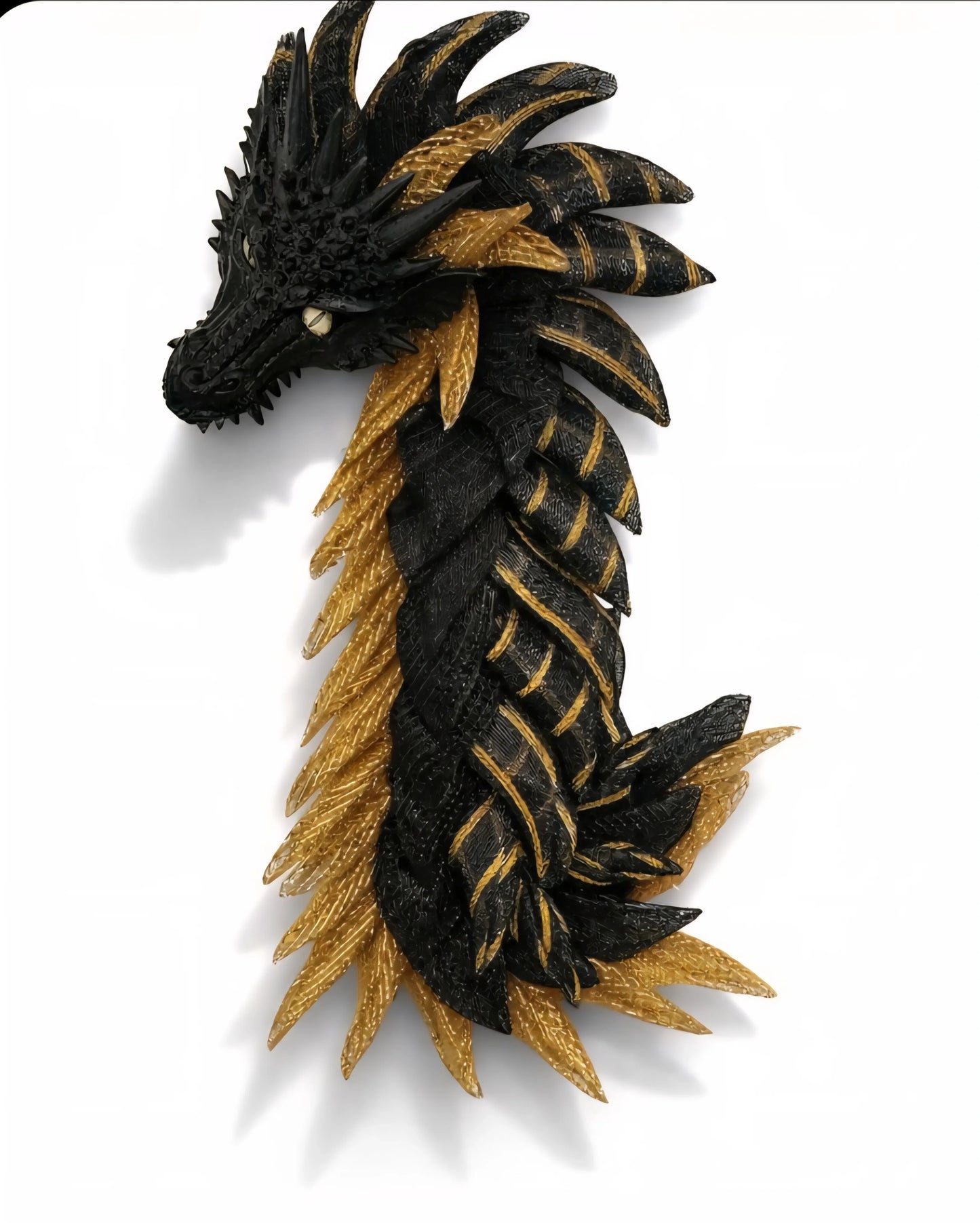 Black and gold dragon wall art sculpture with detailed scales and spikes