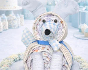Handmade diaper cake bear with blue checkered bow, perfect baby shower gift or keepsake