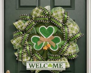 Green plaid St. Patrick's Day wreath with shamrock and welcome sign, perfect for festive front door decor