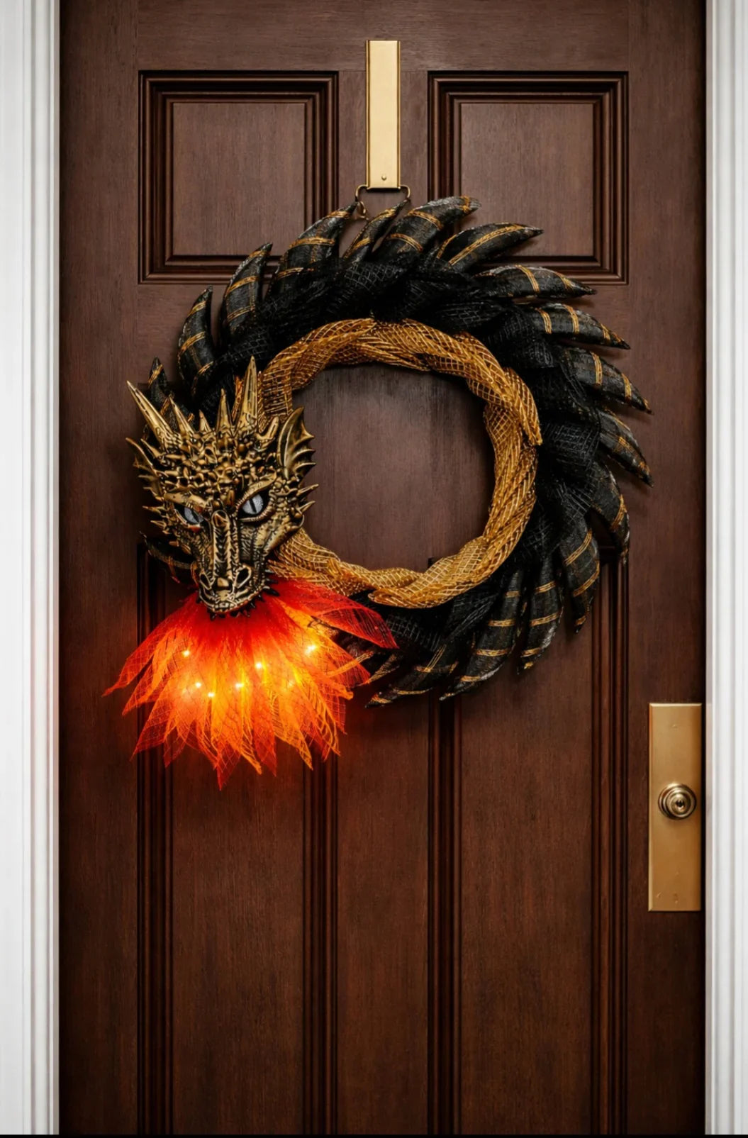 Fantasy dragon wreath with glowing fire breath, perfect for Halloween or fantasy-themed decor.