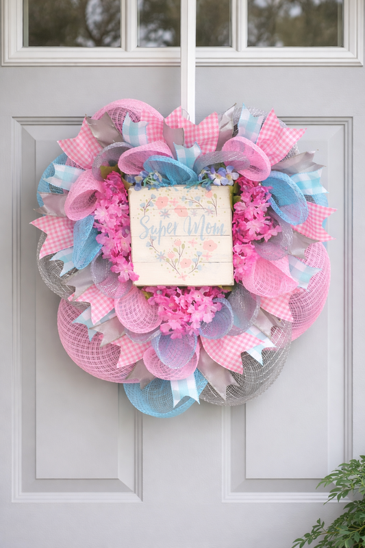 Pink and blue mesh wreath with 'Super Mom' sign, perfect for baby shower gifts or mom decor
